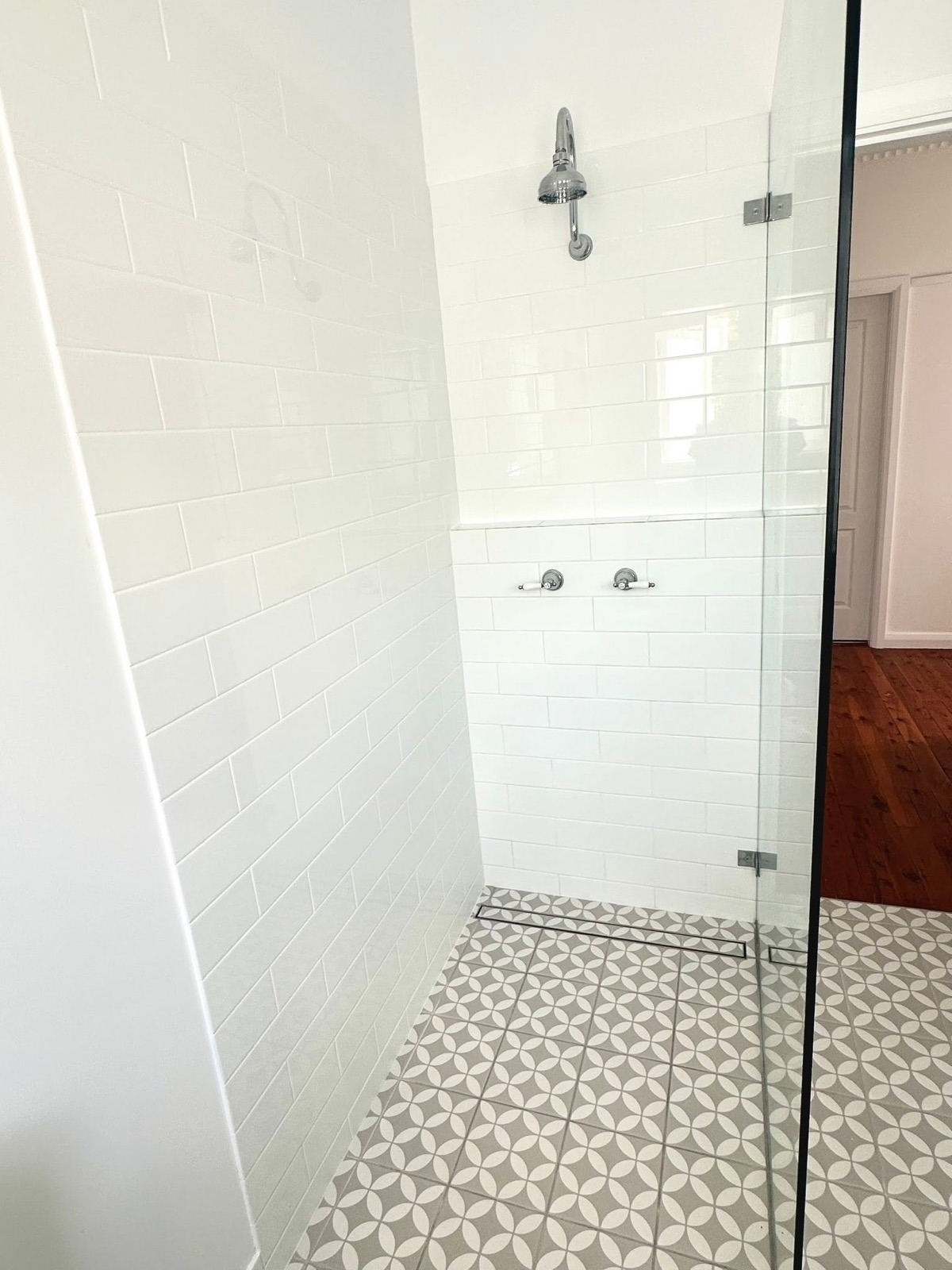 A tiled shower recently completed by Spartan Plumbing & Gas